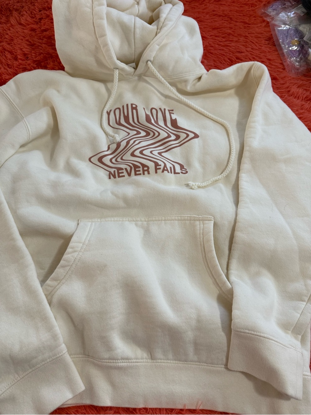 Cream Hoodie with 'Your Love Never Fails' Graphic